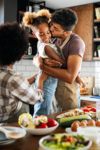 Happy family in community sunrise home loan program 400x600